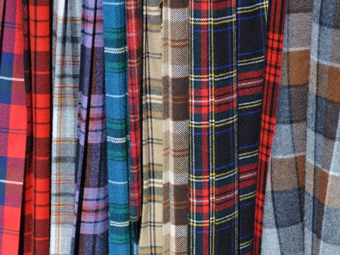 close up of a lineup of various plaid patterns